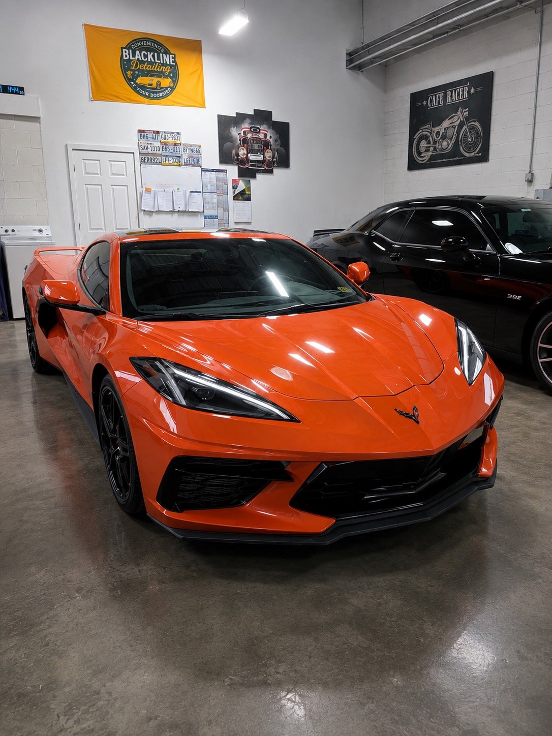 Orange Corvette detailed in the West Chester shop