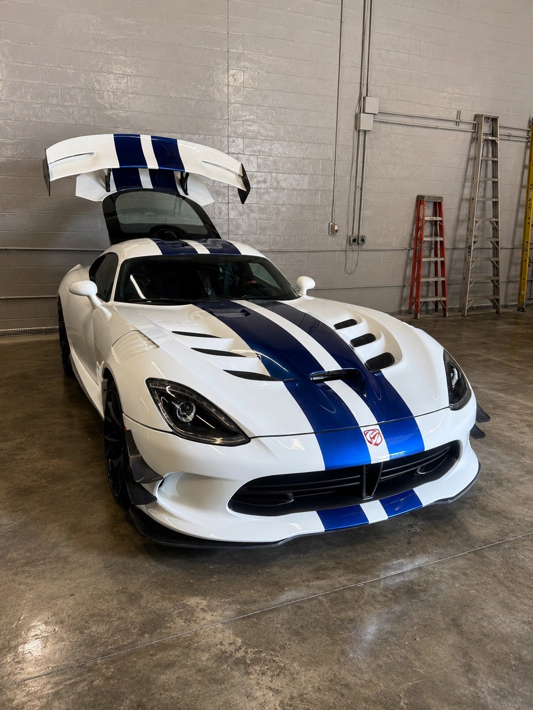 White Dodge Viper with polished paint in the shop